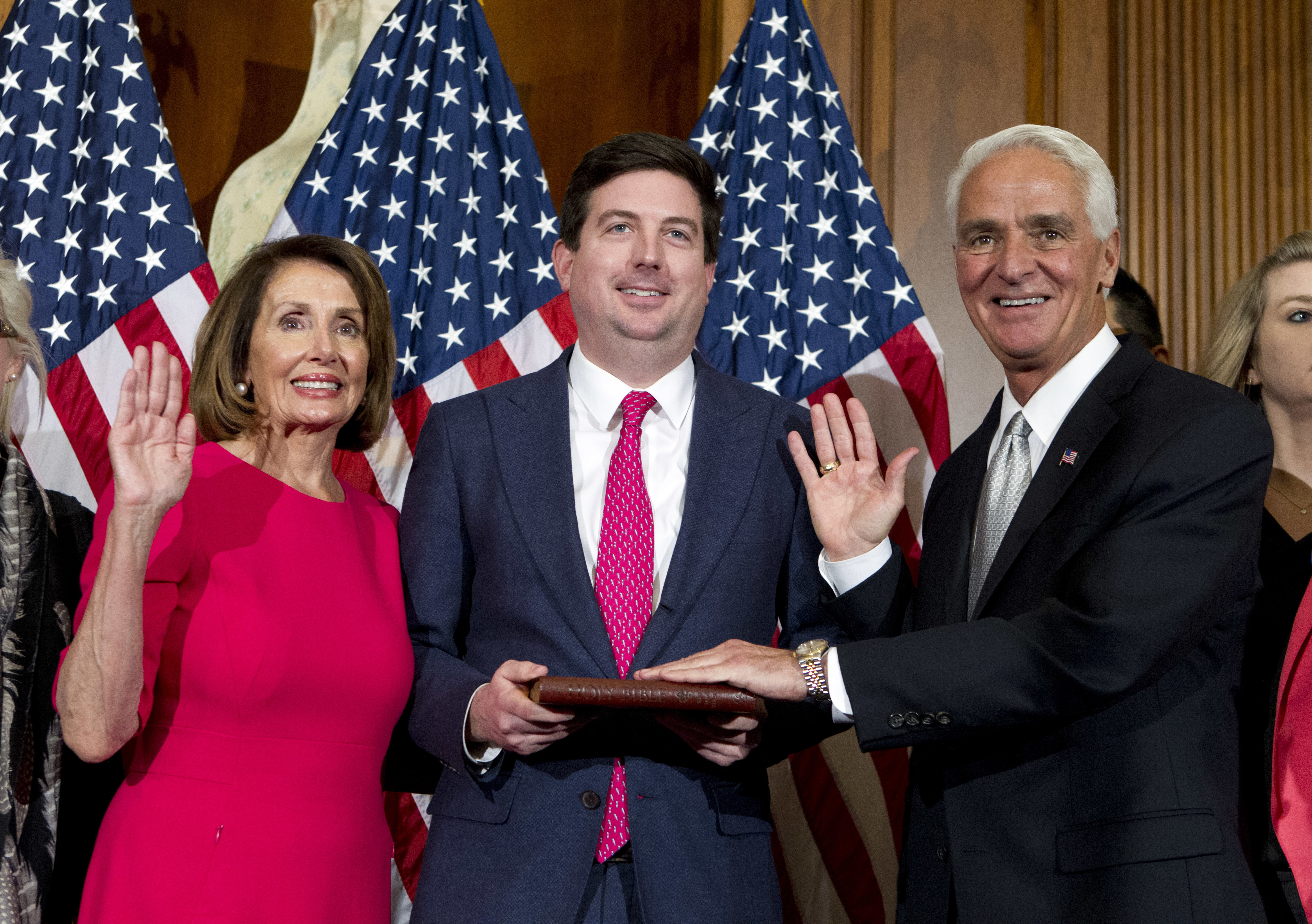Nancy Pelosi administers oath to Charlie Crist during swearing-in ceremony, Jan. 3, 2019