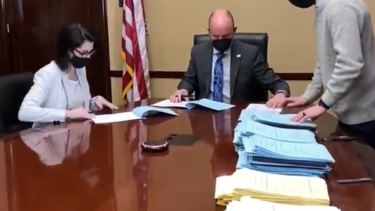 Cox signing bills.jpg