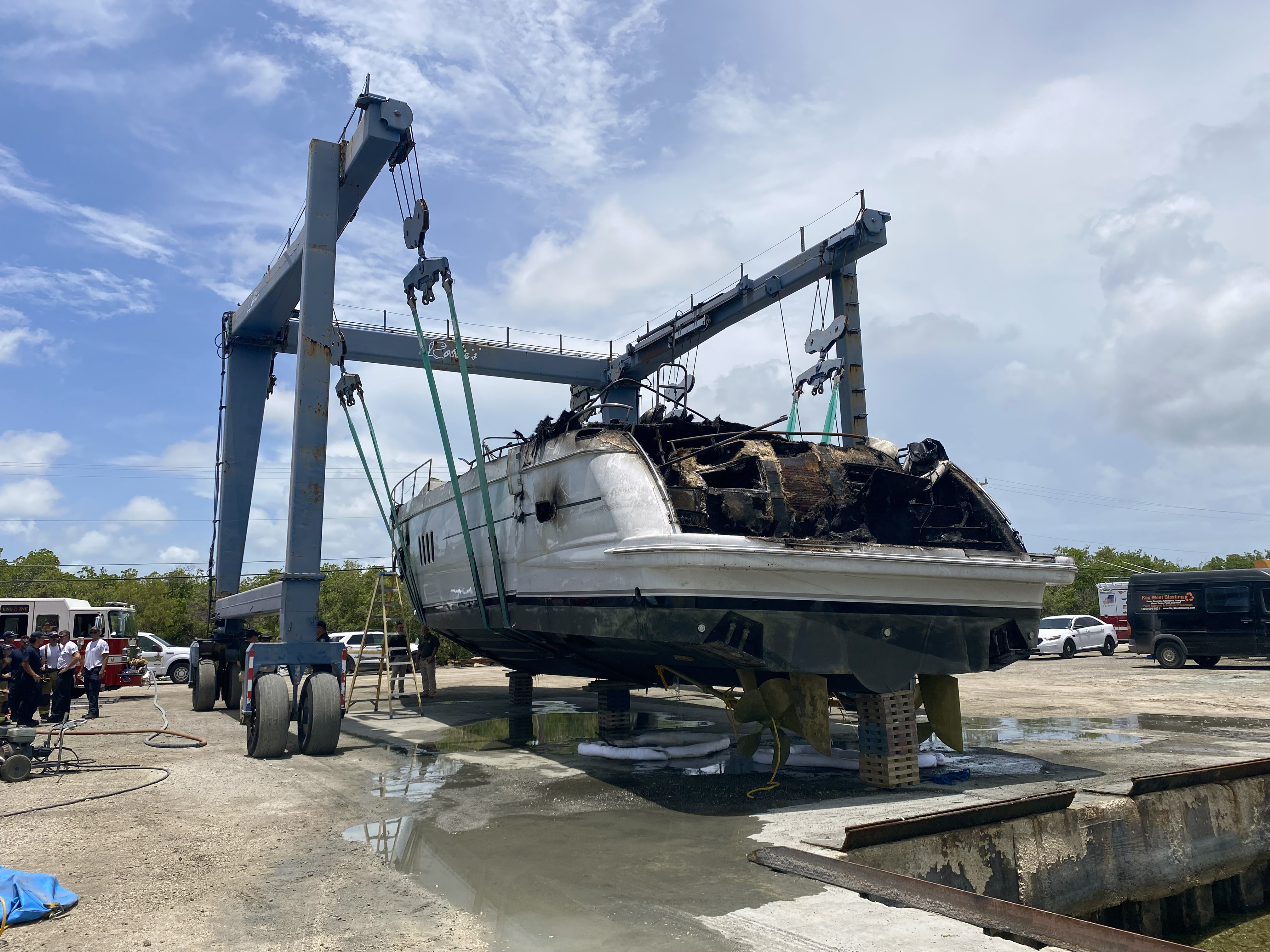 burned yacht at dry dock after marina fire, July 27, 2023