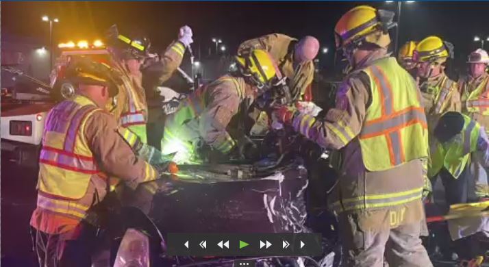 Firefighters rescue person trapped in wreckage from three car crash overnight
