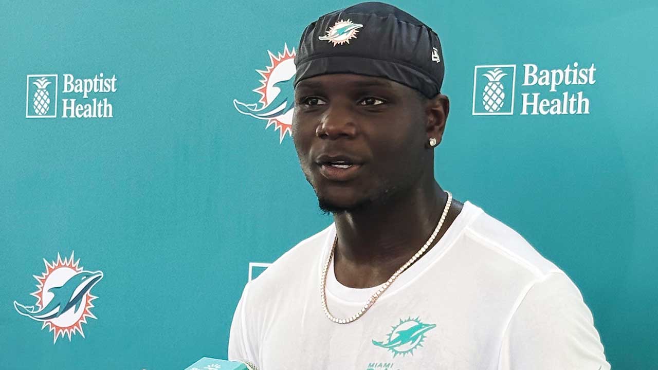 Miami Dolphins wide receiver Chris Bell speaks with media after practice at the NFL football team's training camp, Tuesday, Aug. 18, 2026, in Miami Gardens, Fla.
