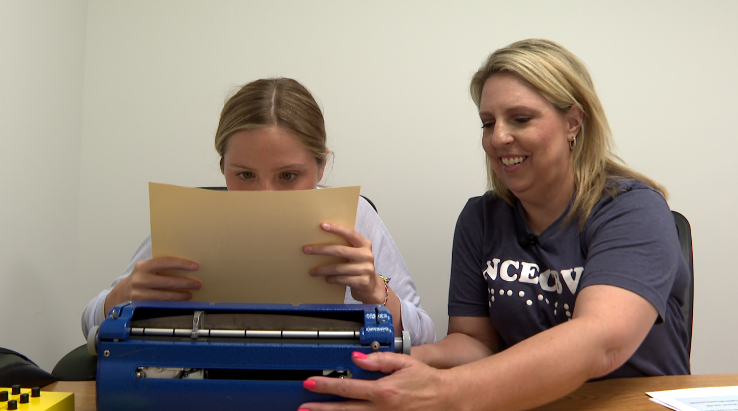 Audrey Graves, right, has taught braille for 20 years. Anna Weber, 14, began learning braille after a CLN3 Batten disease diagnosis.