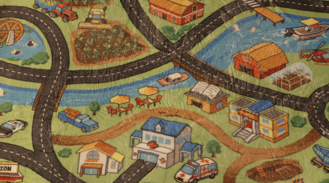 A rug of a city in the Oshkosh Child Development Center.
