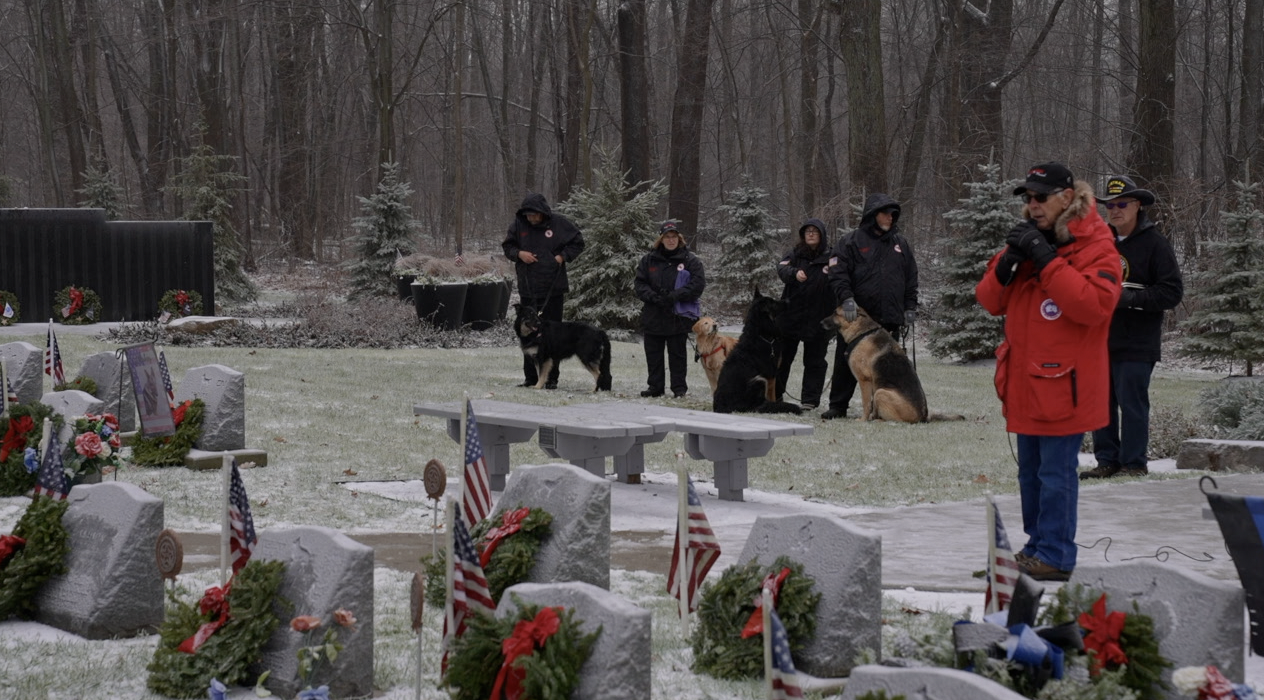 Phil Weitlauf giving a speech at the Michigan War Dog Memorial for Wreaths Across America ceremony