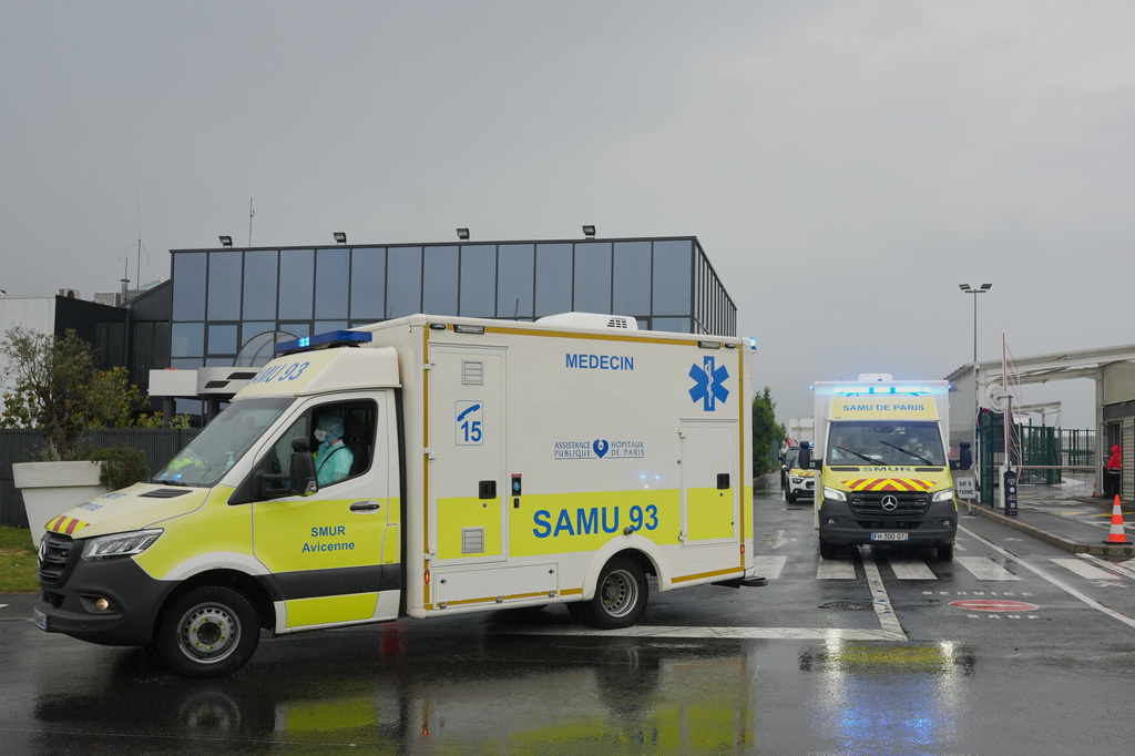 Ambulances carrying patients evacuated from the MV Hondius cruise ship with suspected hantavirus infection, leave the Bourget airport, north of Paris, Sunday, May 10, 2026. 
