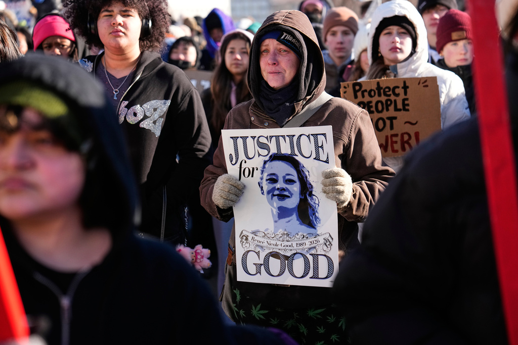 Protesters gather in front of the Minnesota State Capitol in response to the death of Renee Good, who was fatally shot by an ICE officer.