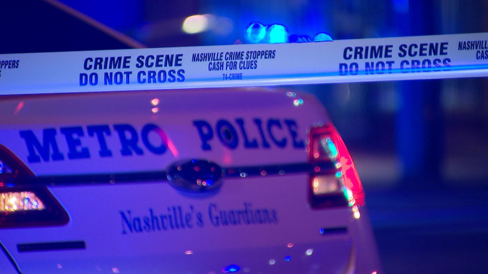crime scene tape metro police car trunk.jpg