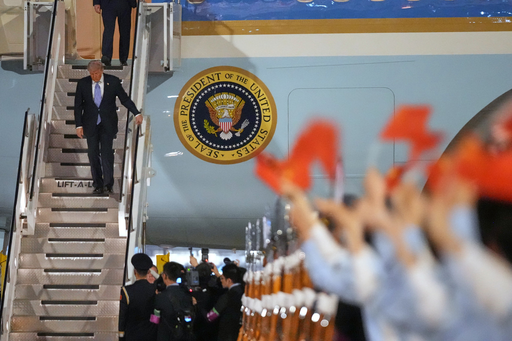 President Donald Trump arrives on Air Force One, Wednesday, May 13, 2026, at Beijing Capital International Airport in Beijing.