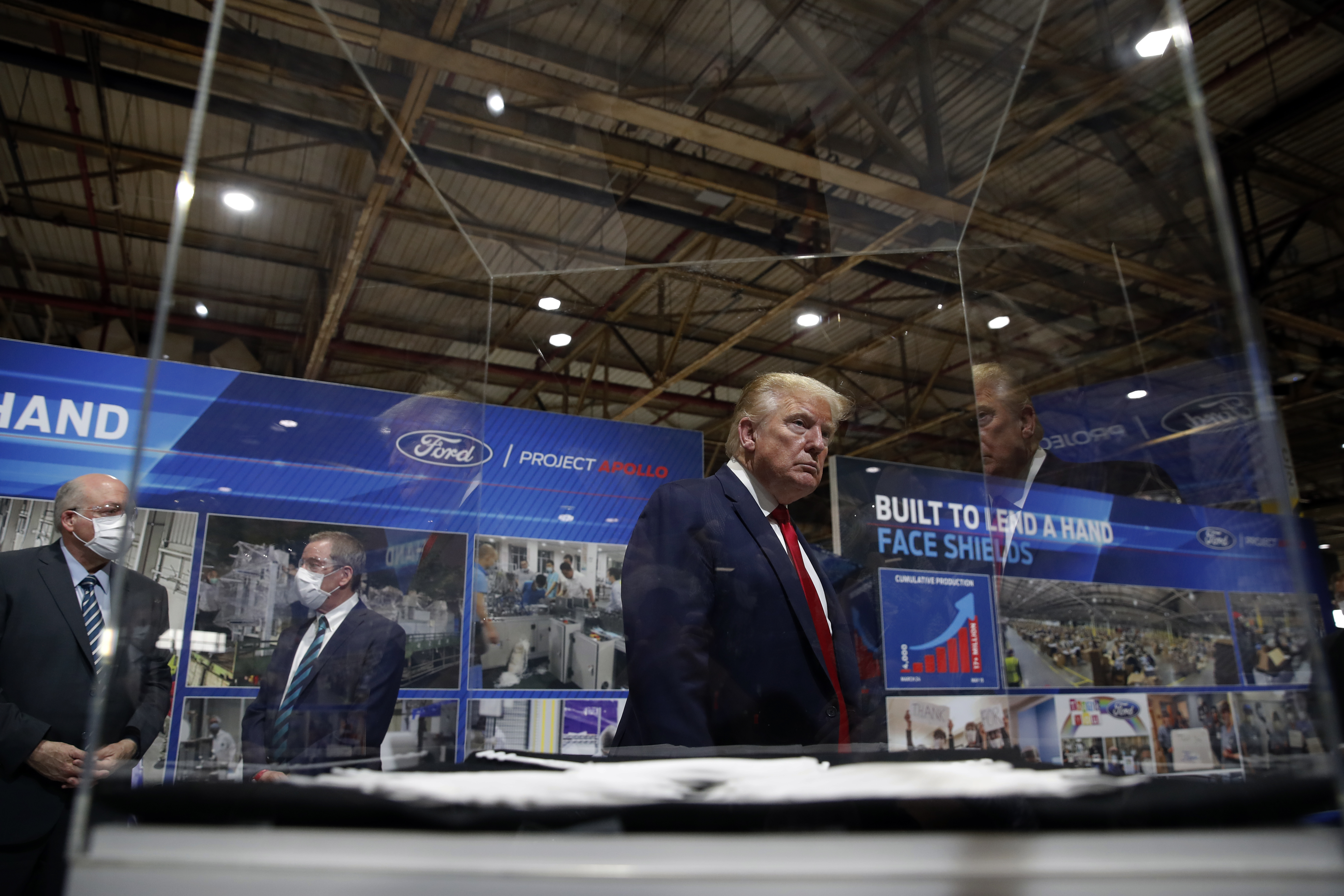 Trump tells reporters he doesn't want them seeing him in a mask at Mich. Ford plant producing PPE