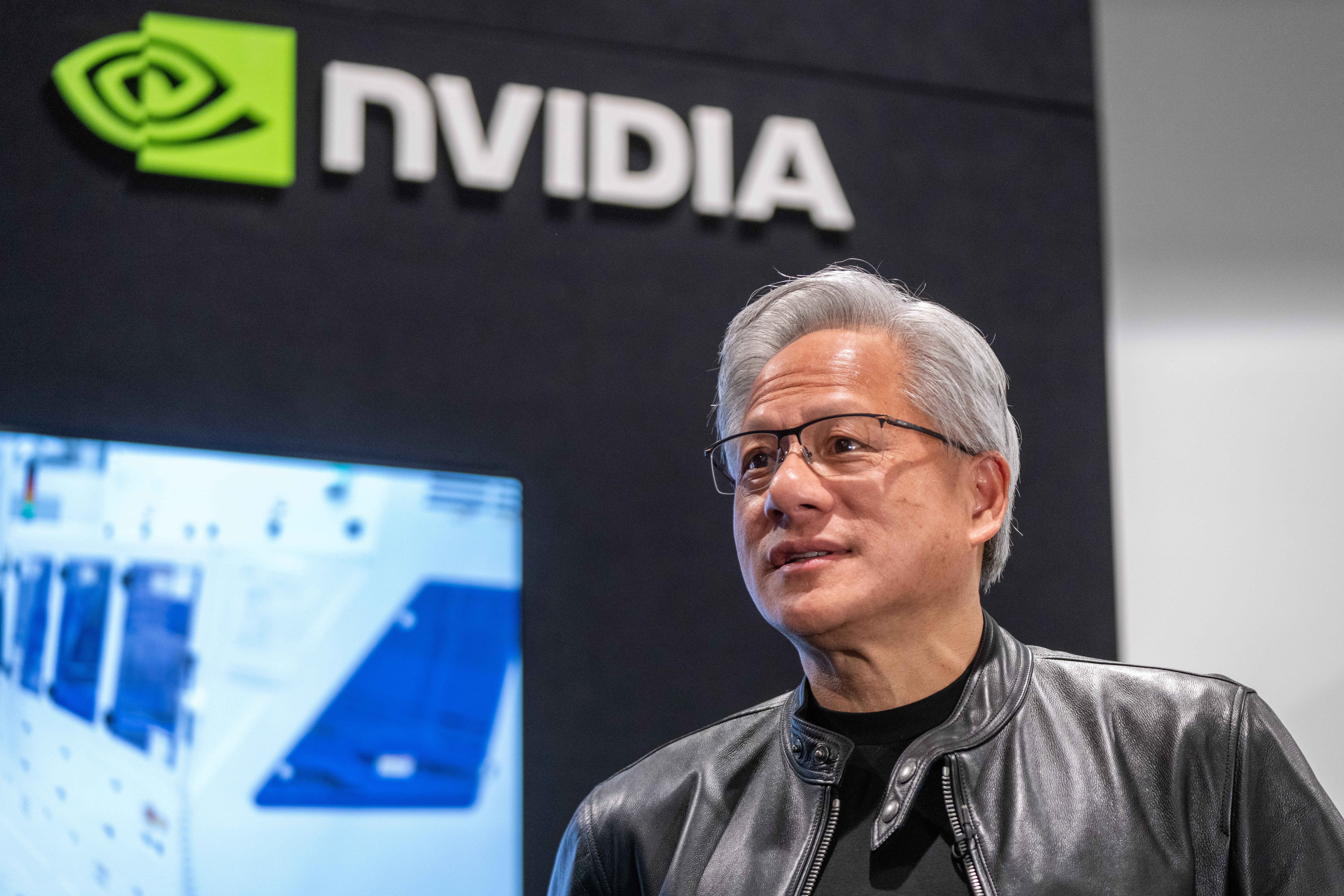 FILE - Jensen Huang, president and CEO of Nvidia, waits for a groundbreaking ceremony for an expansion of Coherent's manufacturing facility to begin on June 16, 2026, in Sherman, Texas.