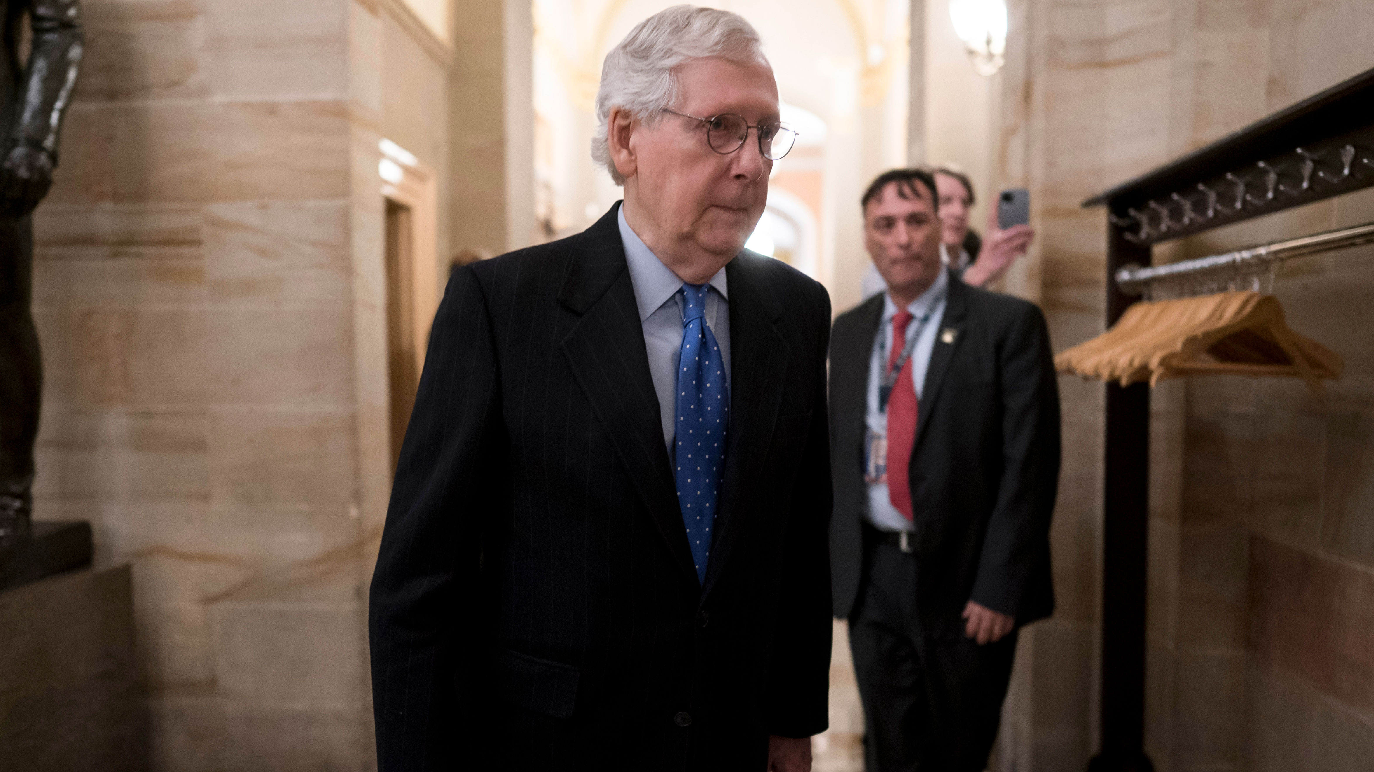 Senate Minority Leader Mitch McConnell, R-Ky., arrives as Senate Republicans gather in the historic Old Senate Chamber for debate as they choose their leadership, at the Capitol in Washington, Wednesday, Nov. 16, 2022. Sen. Rick Scott, R-Fla., an ally of former President Donald Trump, is challenging longtime GOP leader Sen. Mitch McConnell, R-Ky. 