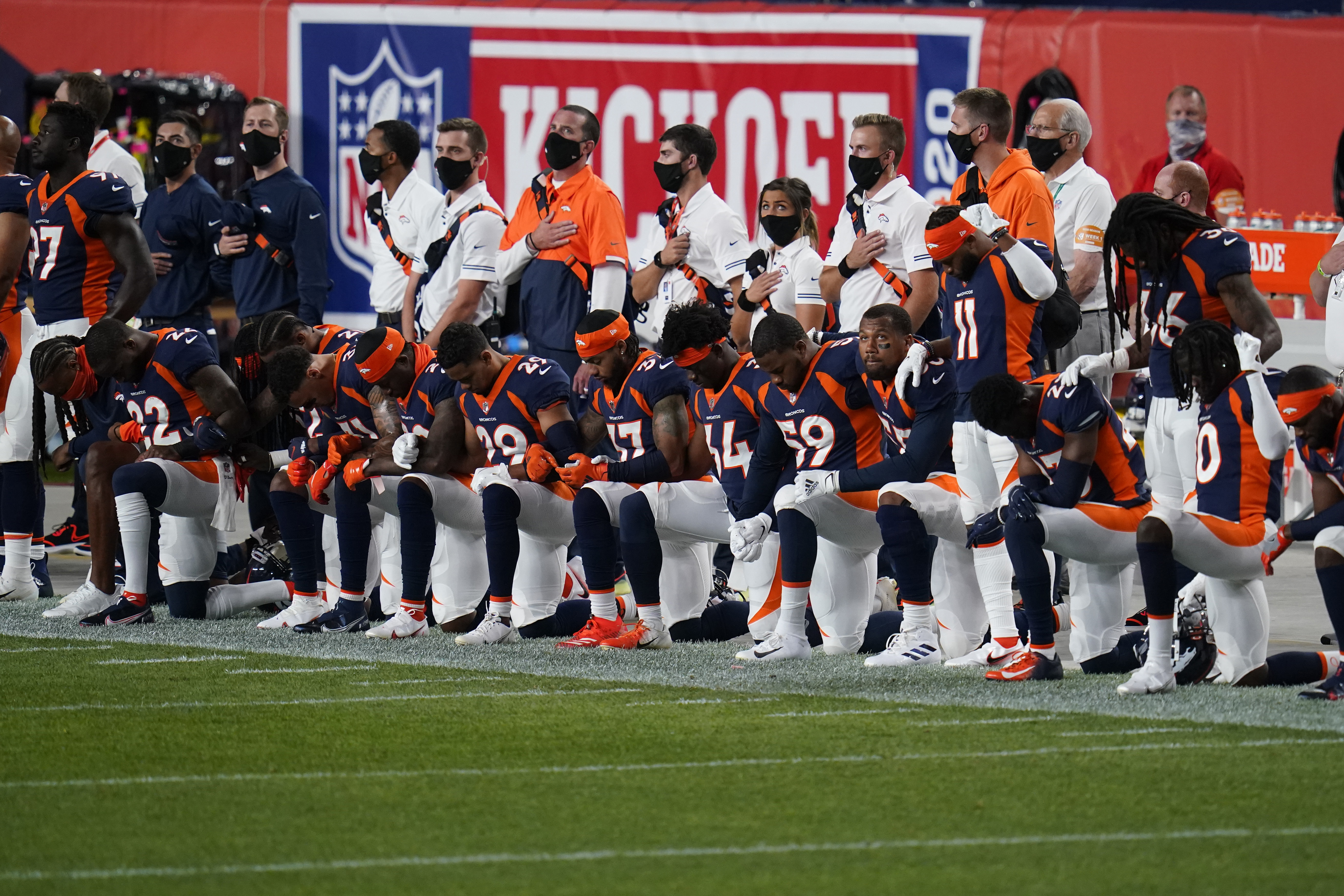 broncos kneel during national anthem before 2020 season opener against titans.jpg 