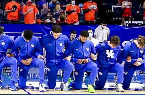 UK players kneeling.PNG