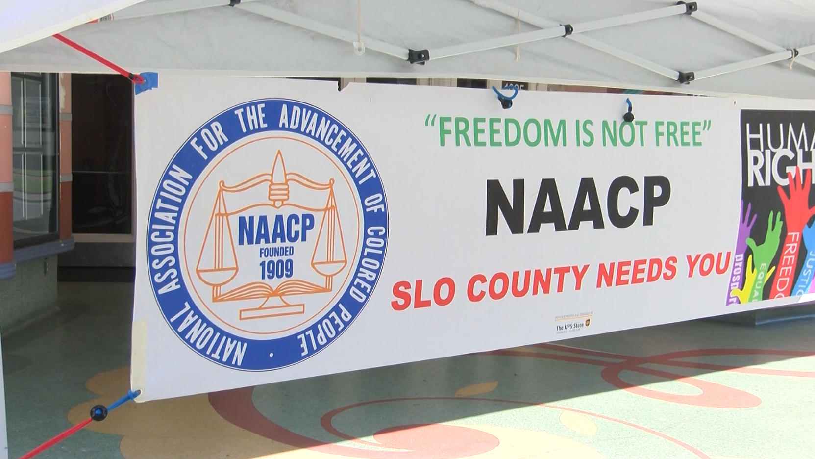 NAACP rally sign.PNG