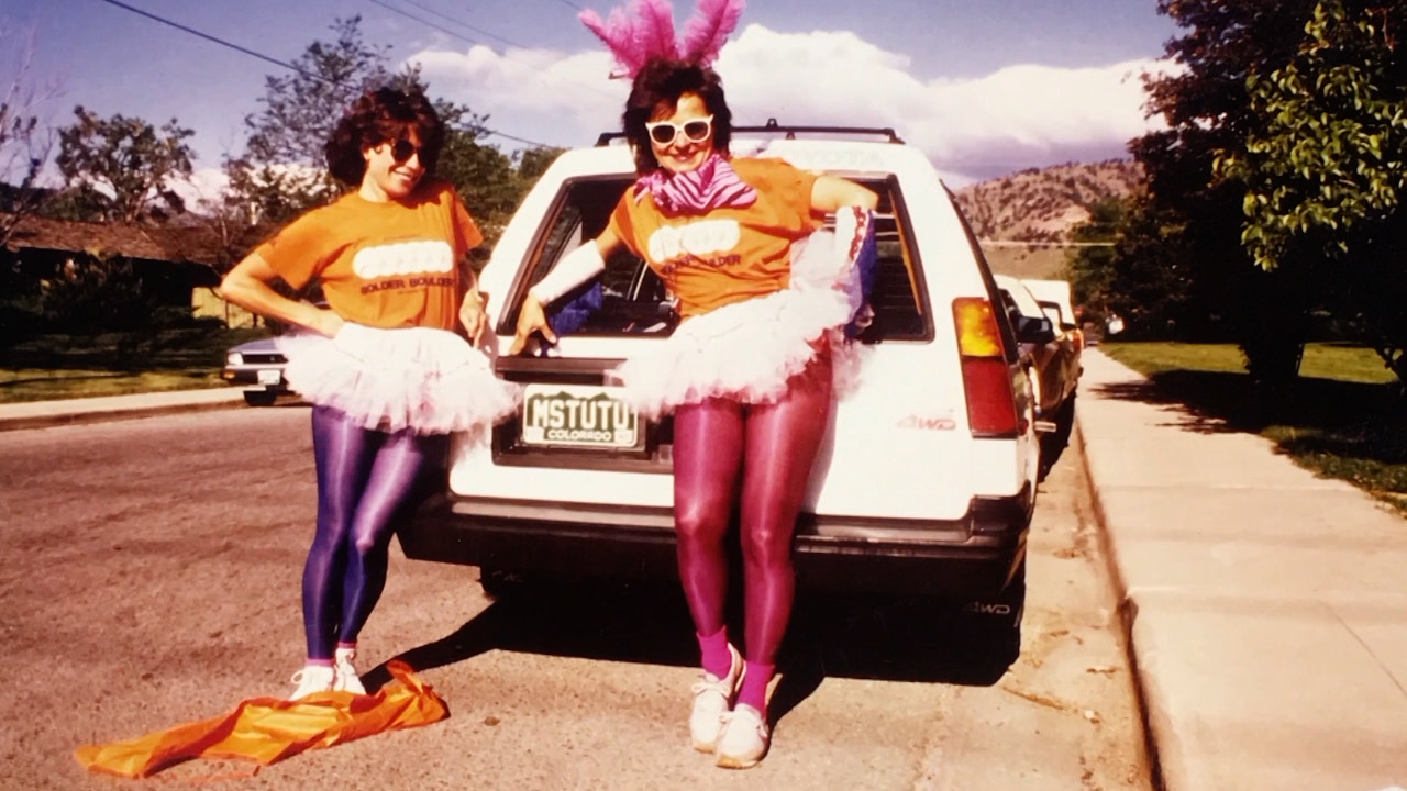 Ms. Tutu and a friend along the BOLDERBoulder course