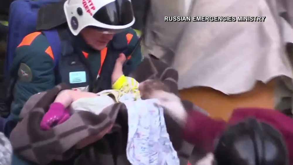 wptv-baby-rescued-rubble-russian-buildingcollapse.jpg