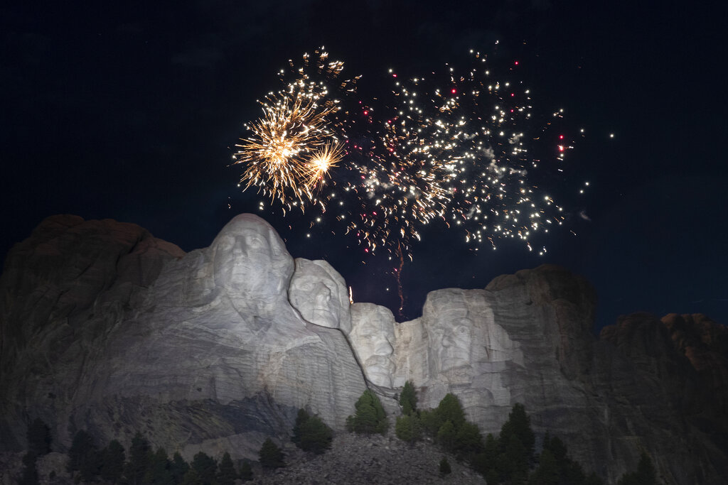 Fireworks burst at Mount Rushmore National Memorial, Friday, July 3, 2020.