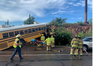 A school bus wreck shut down Valencia Road between Camino de la Tierra and Caballo Road Wednesday.
