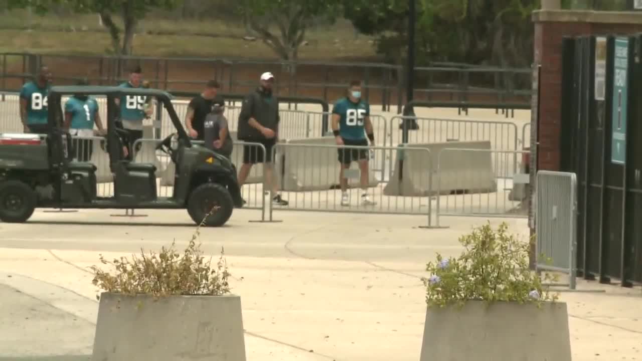 Tim Tebow wearing No. 85 jersey after signing with Jacksonville Jaguars, May 20, 2021