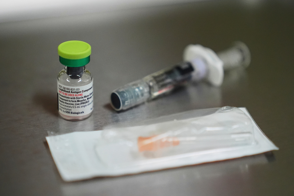 A vial of the measles, mumps and rubella (MMR) vaccine is pictured at International Community Health Services, Wednesday, Sept. 10, 2025, in Seattle. 