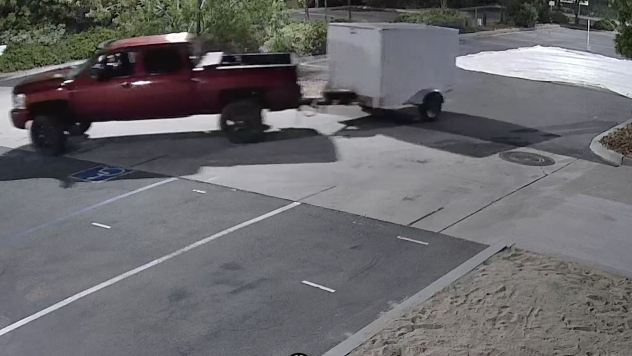 Maroon truck drives away with Boy Scout 667 and 1667's camping equipment .png