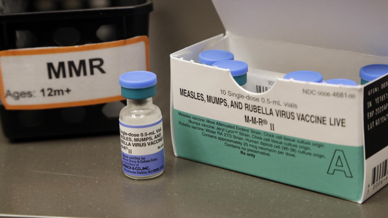 A dose of the measles, mumps and rubella vaccine.