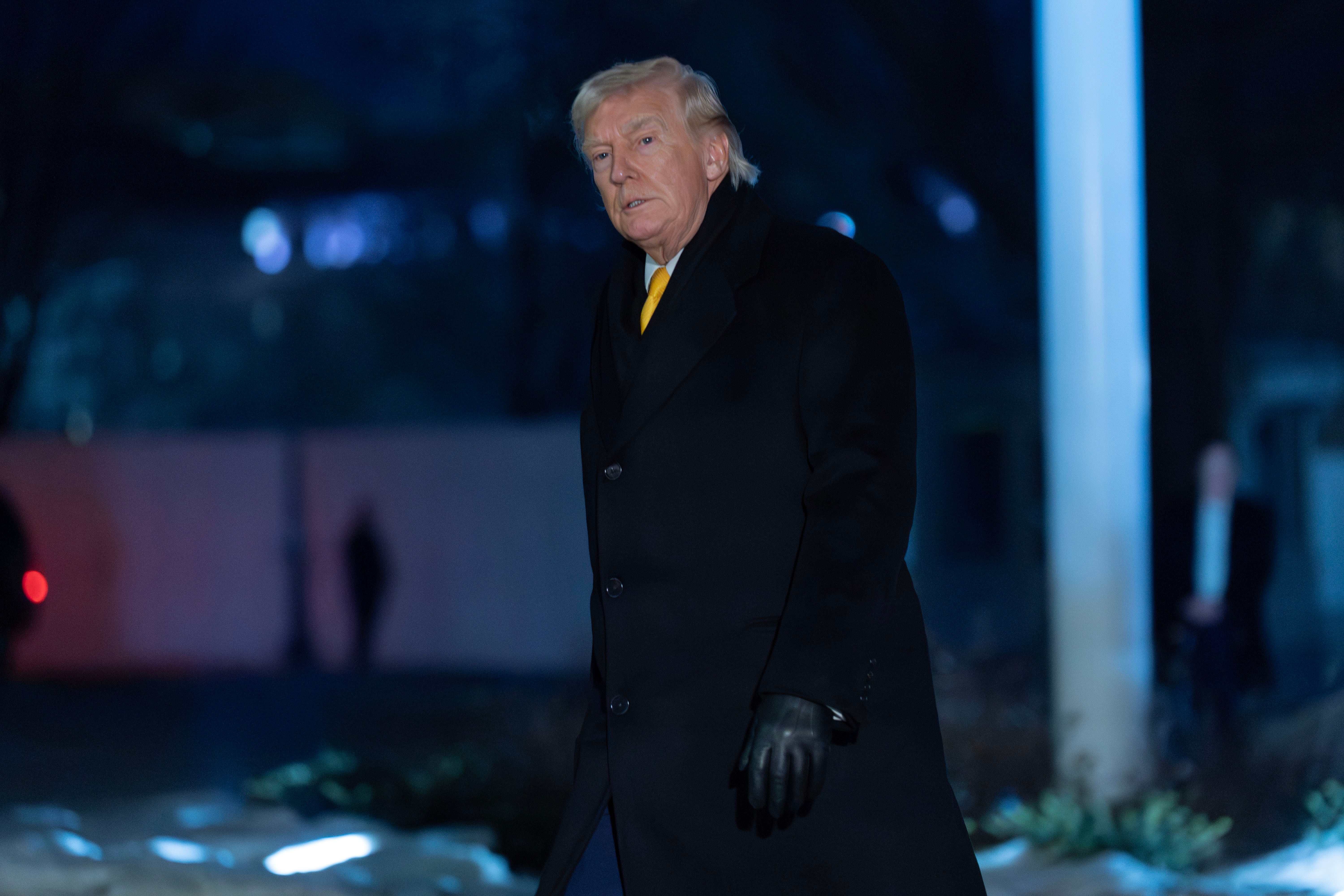 President Donald Trump walks on the South Lawn upon his arrival to the White House, Monday, Feb. 9, 2026, in Washington. 