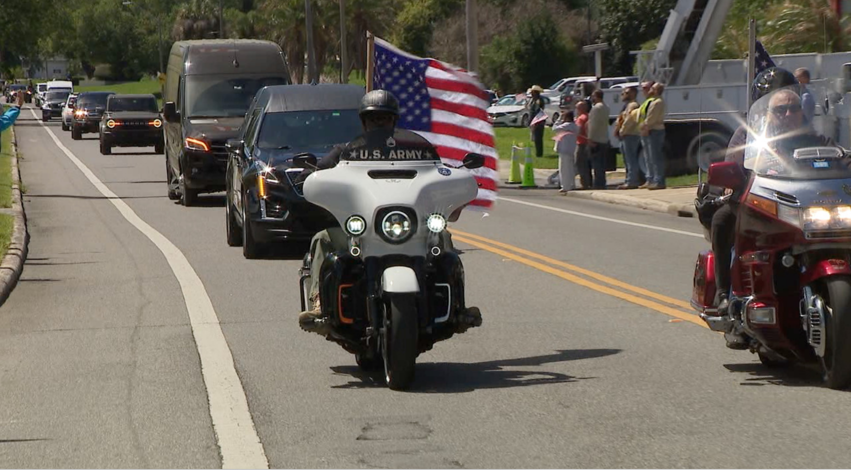 Procession for Major Cody Khork passes Florida Southern College where scholarship honors him