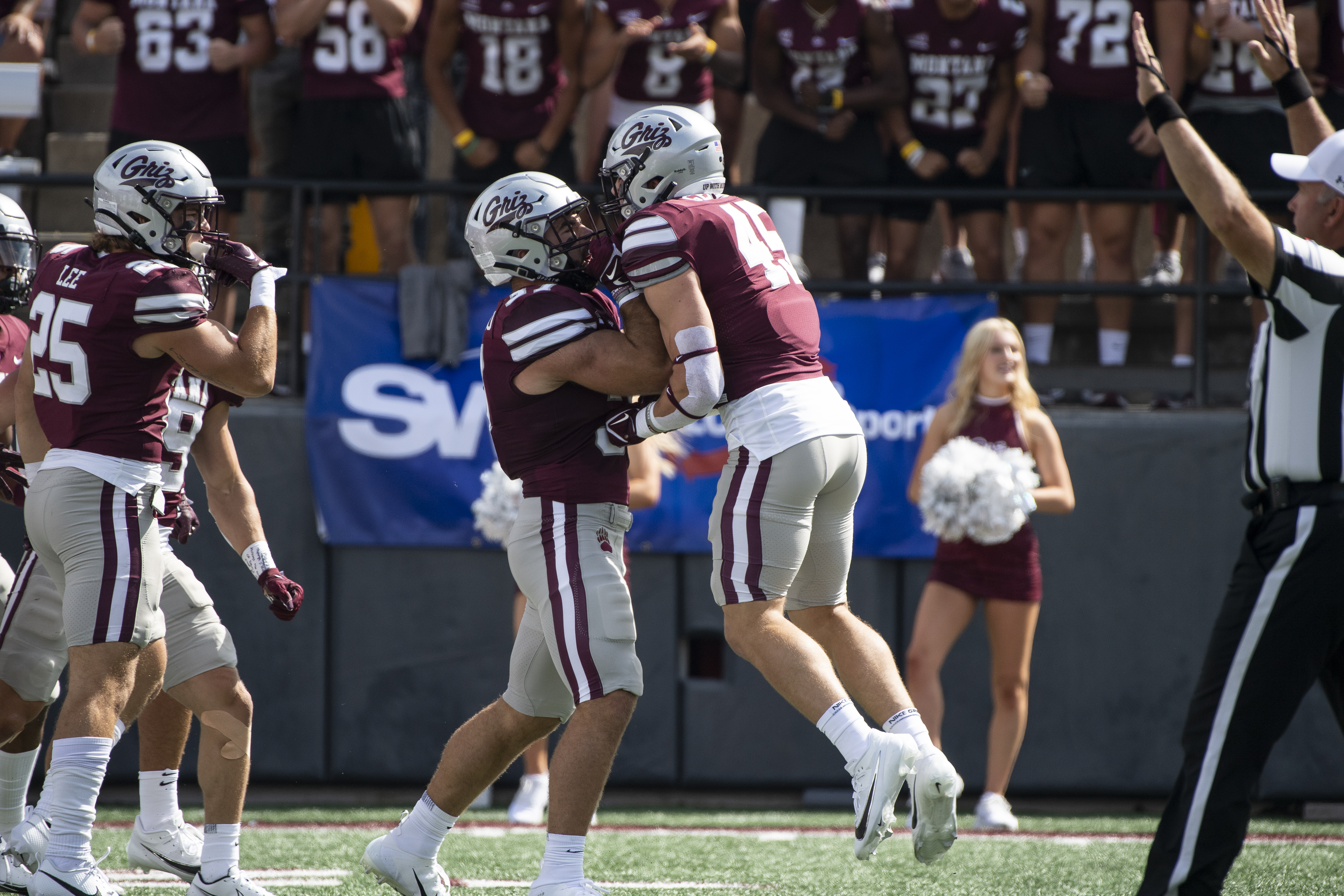 Vincent Genatone (45) celebrates a tackle with senior Levi Janacaro
