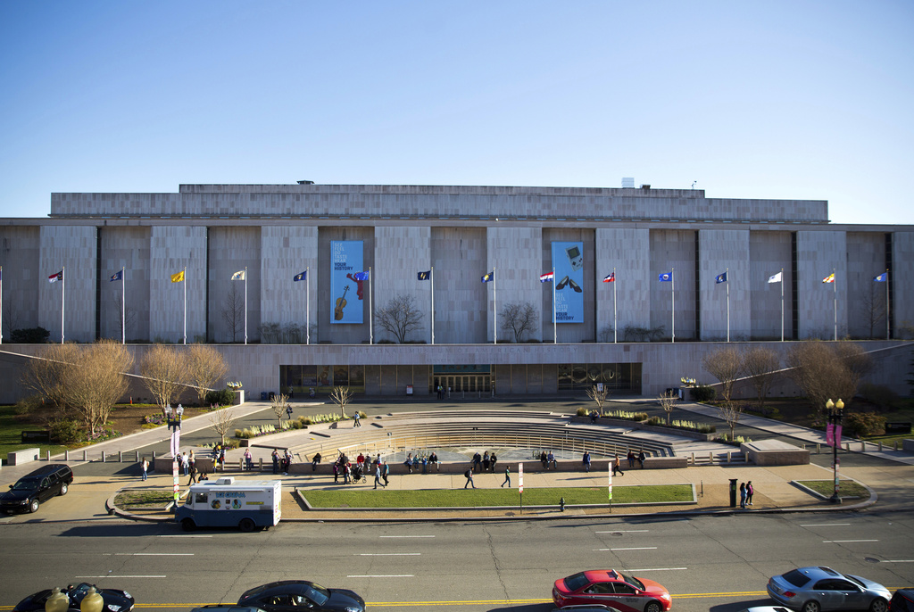 People visit the Smithsonian Museum of American History on the National Mall in Washington.