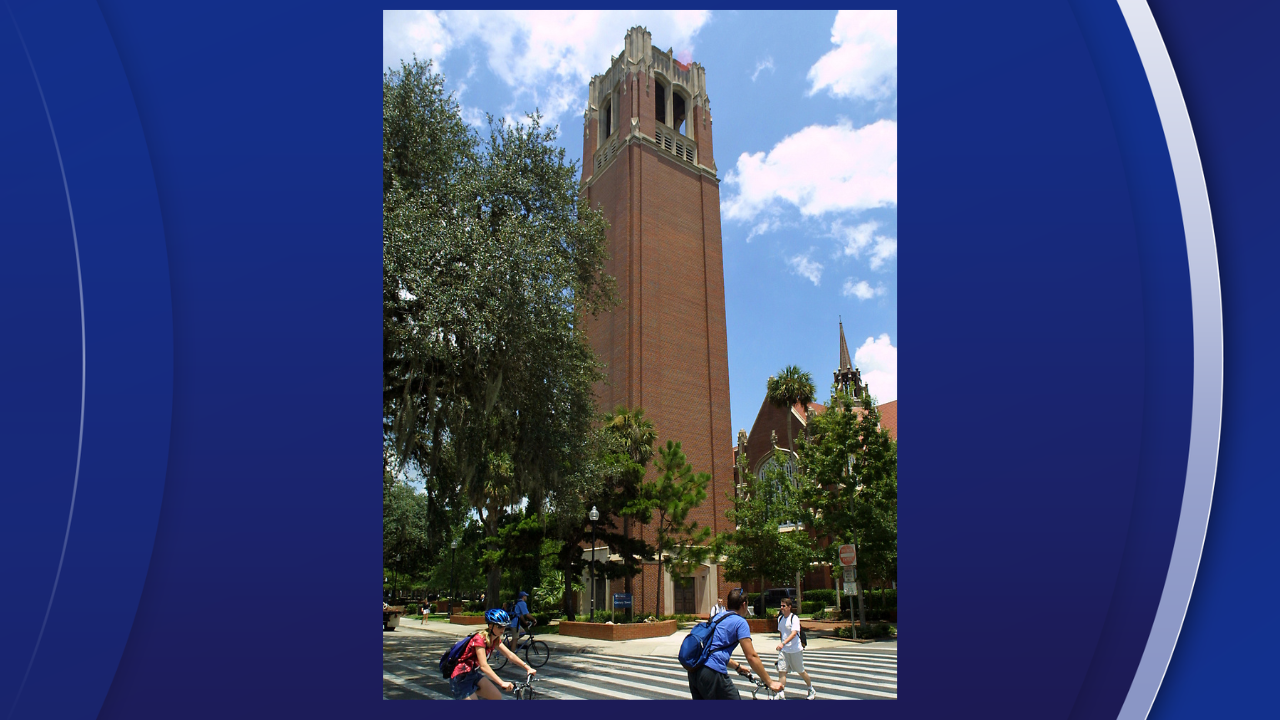University of Florida students make their way through a crosswalk near the campus landmark Century Tower in Gainesville Fla.