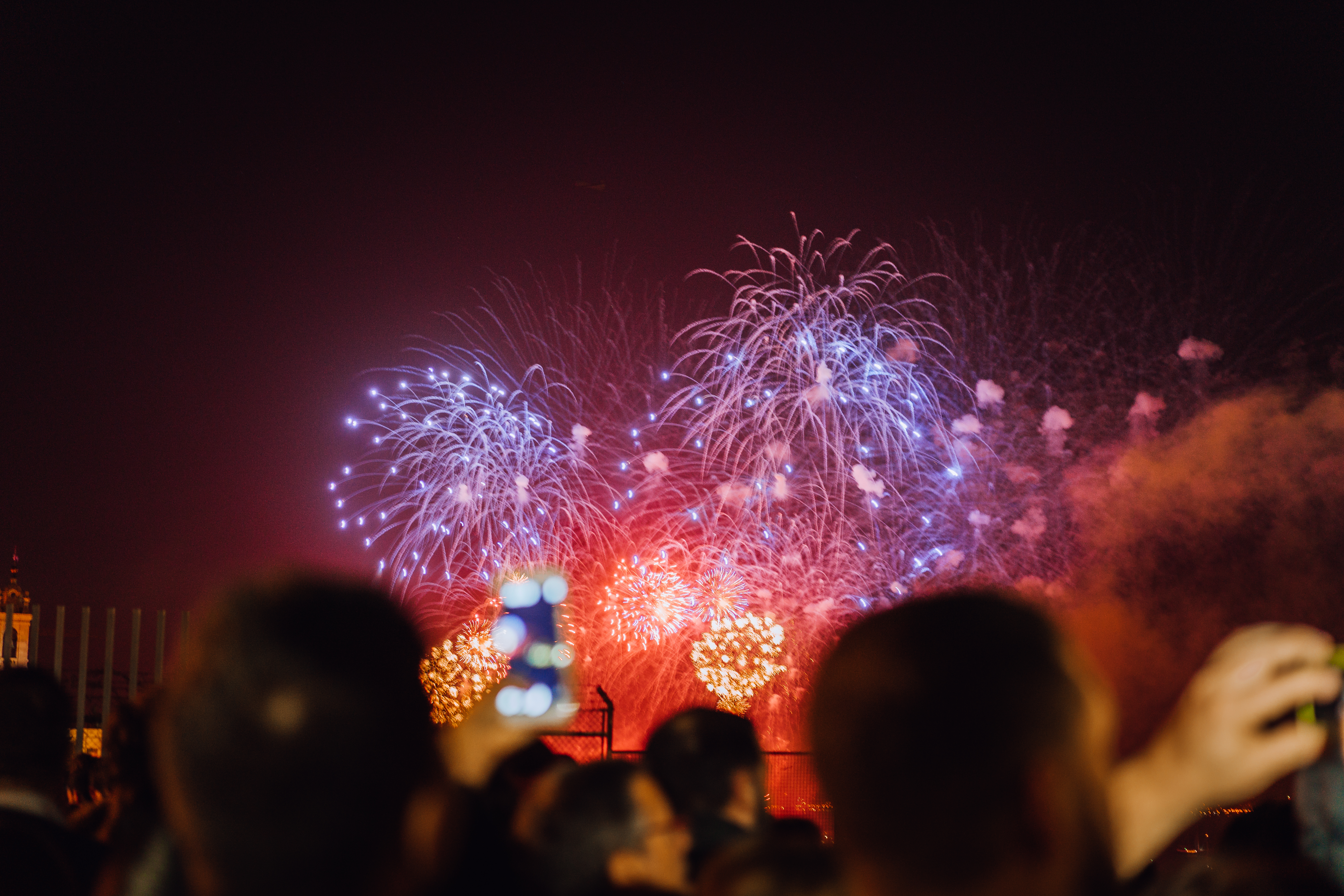 People watching fireworks and celebrating New Year