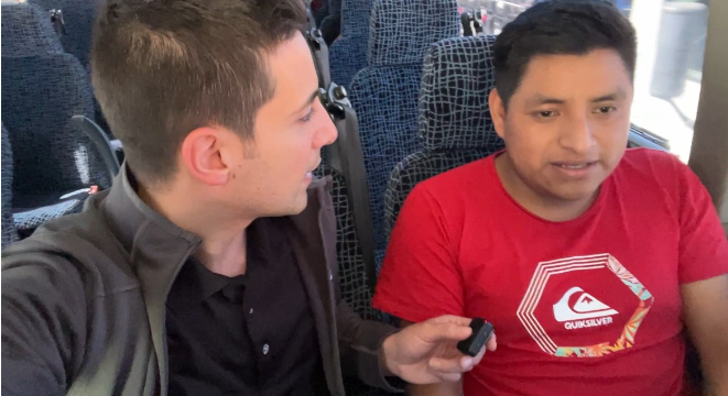 Speaking with a migrant trying to cross the border