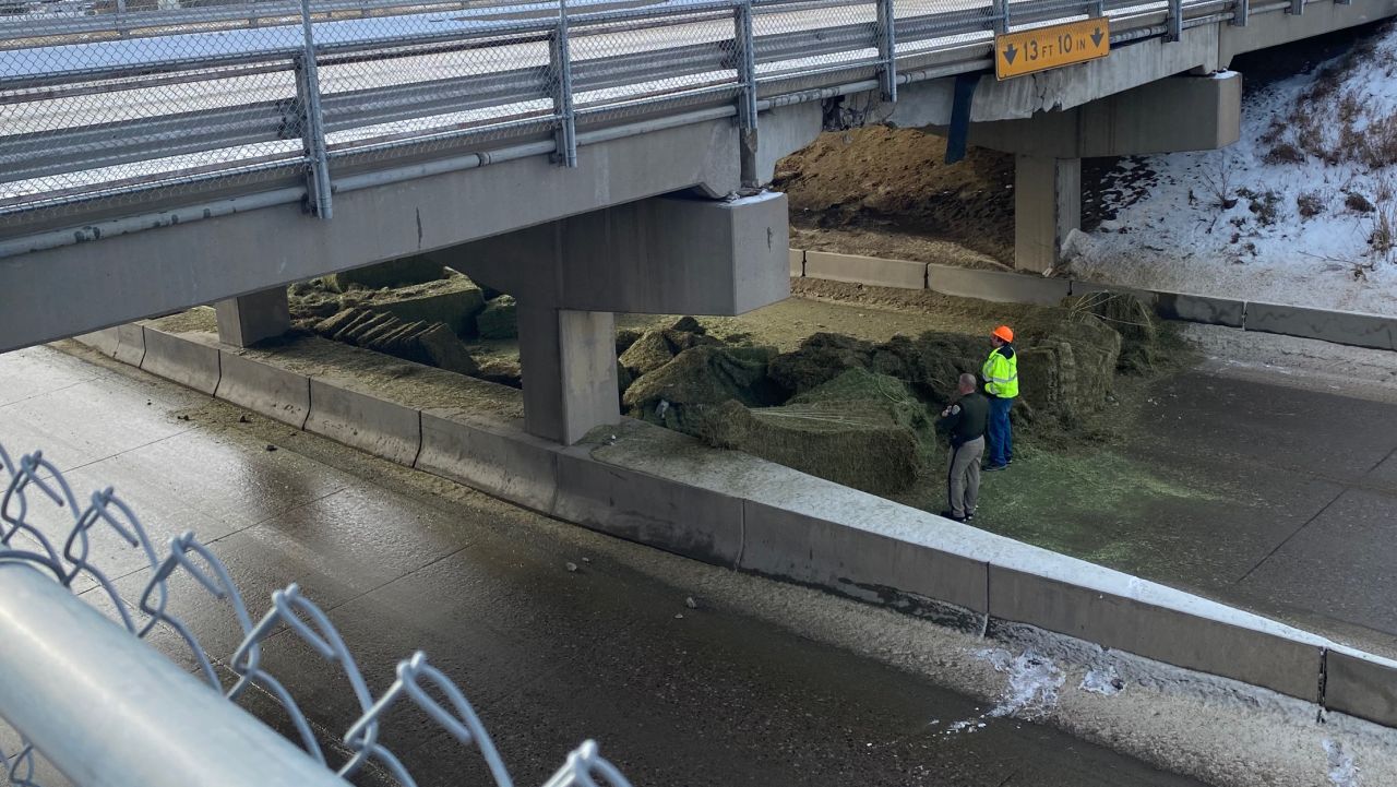 Truck clips overpass bridge on 15th Street North