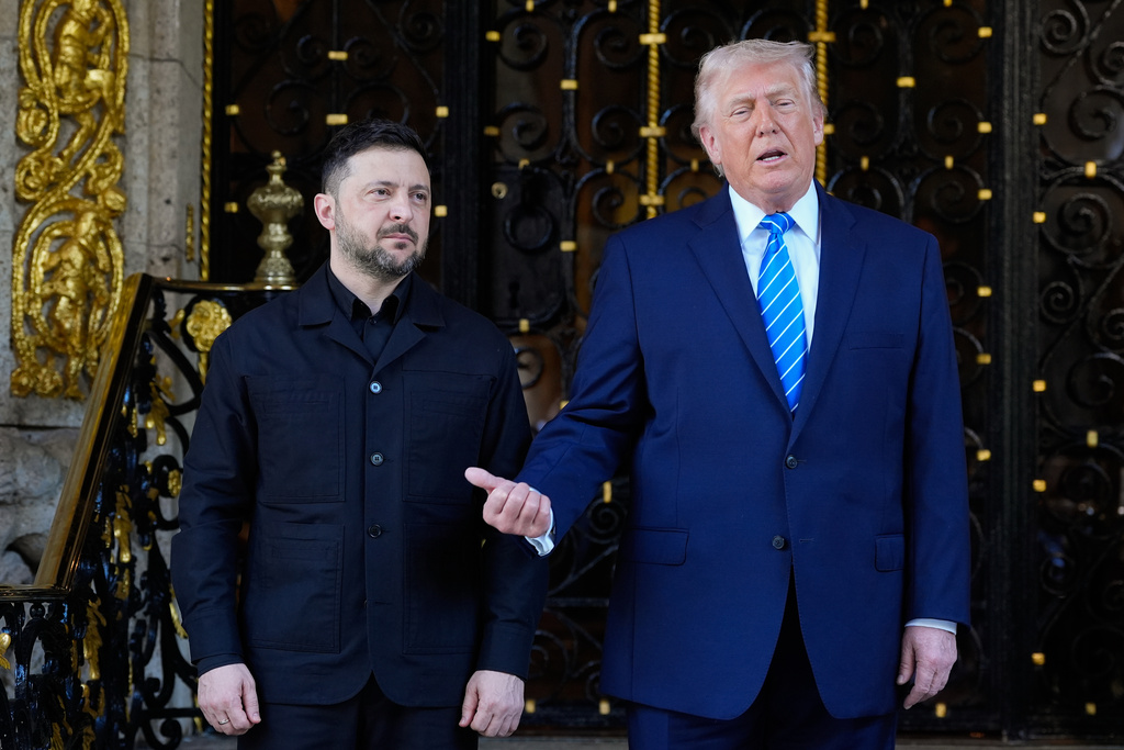 President Donald Trump greets Ukraine's President Volodymyr Zelenskyy at his Mar-a-Lago club, Sunday, Dec. 28, 2025, in Palm Beach, Fla.