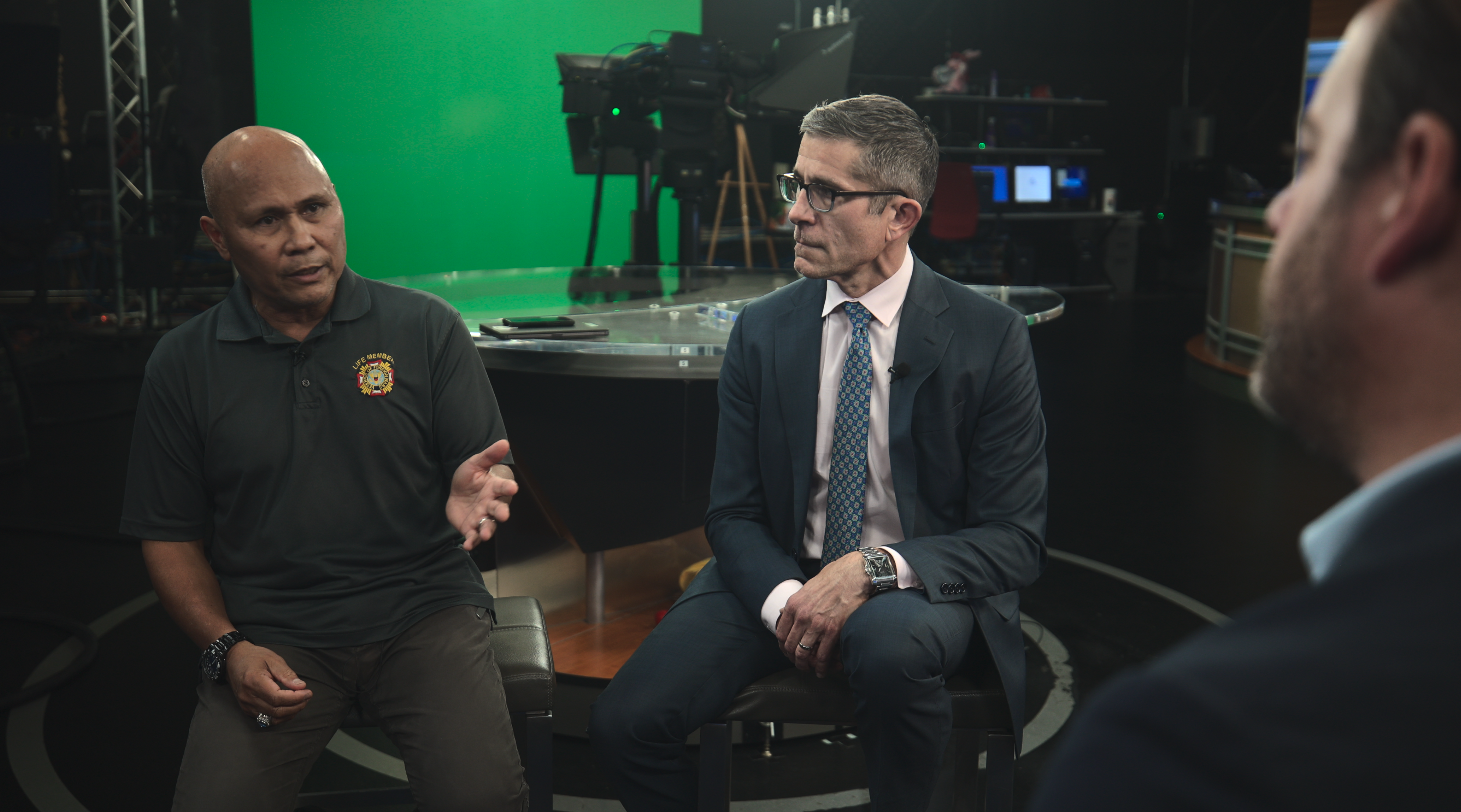 Col. DJ Reyes (left) and attorney Michael Maddux (right).