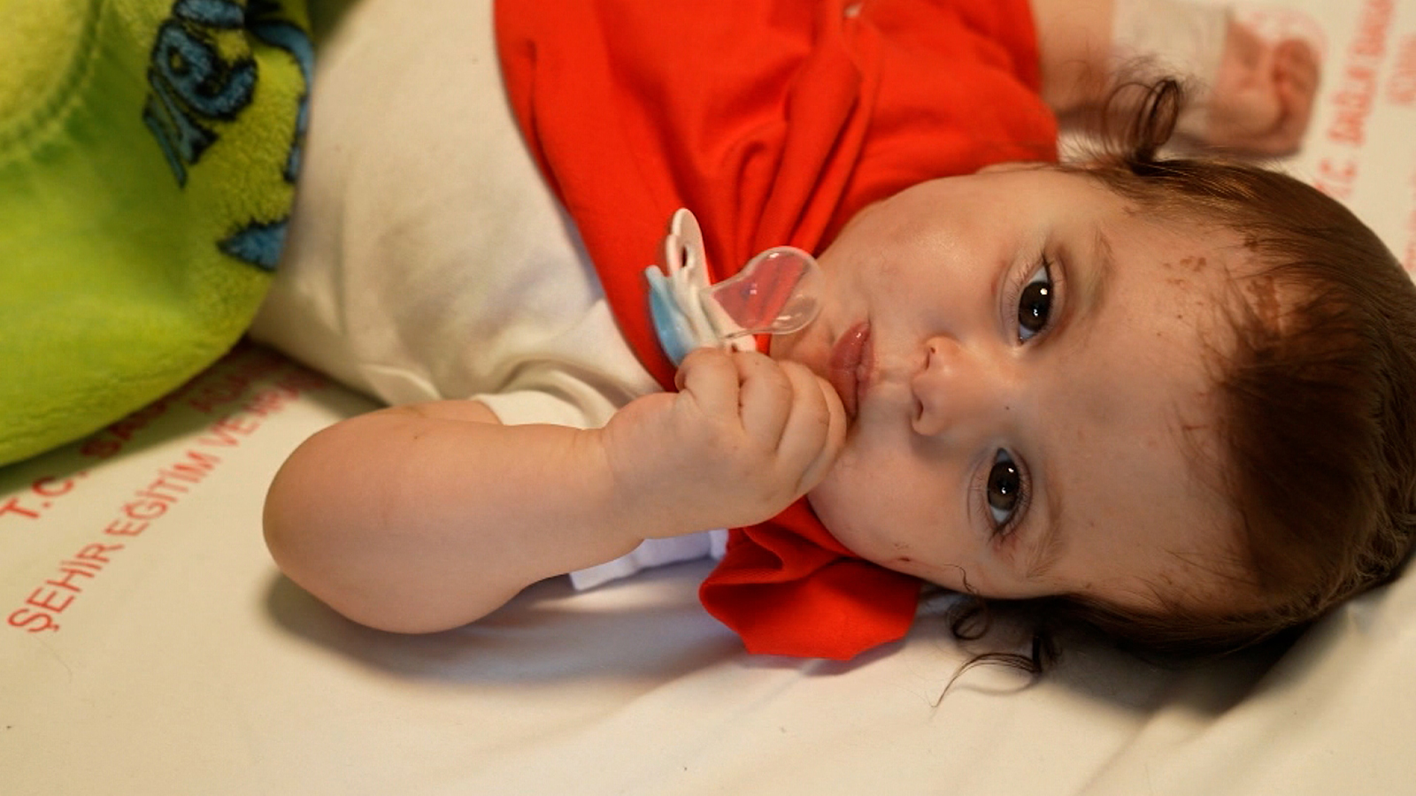 Amid devastating loss, Turkish family reunited with 'miracle baby' found in quake rubble