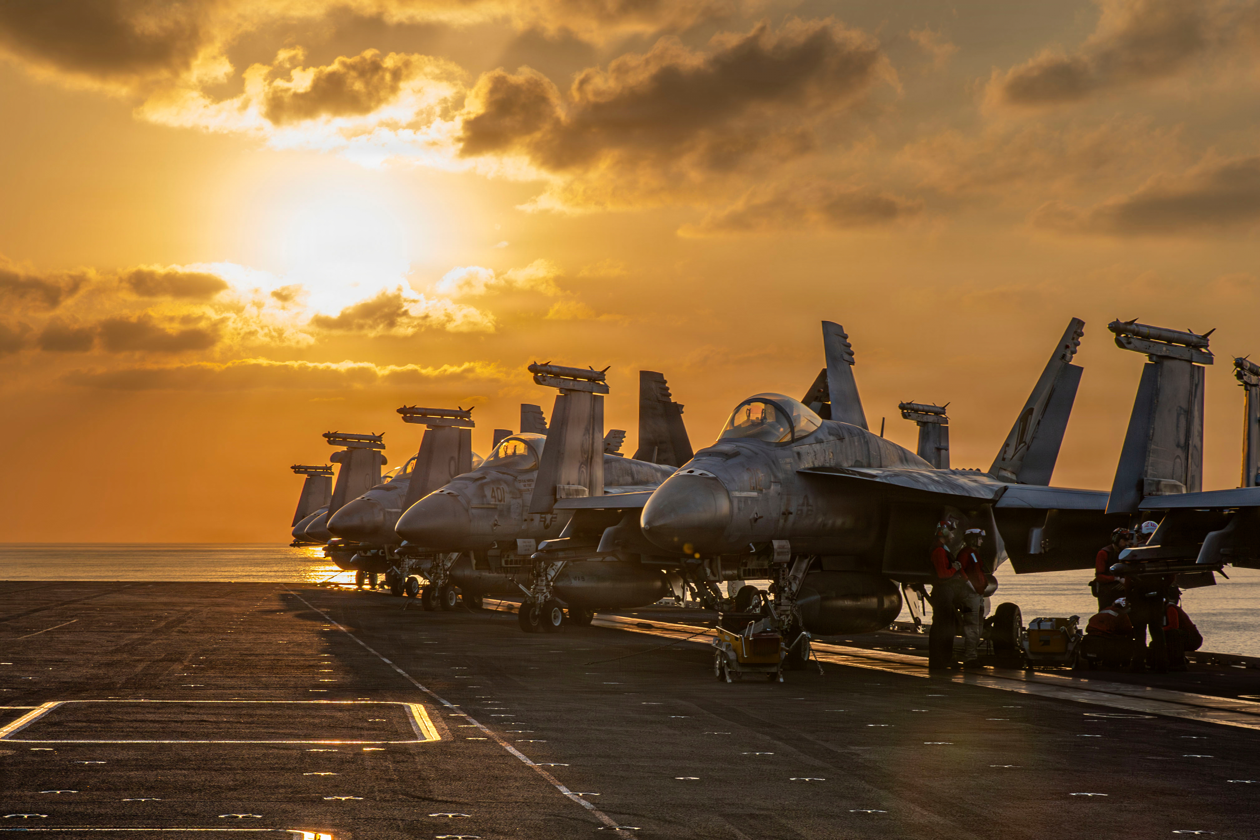 This image provided by U.S. Central Command shows aircraft on the flight deck of the USS Abraham Lincoln (CVN 72) that are operating in support of the war in Iran, on Tuesday, March 3, 2026.