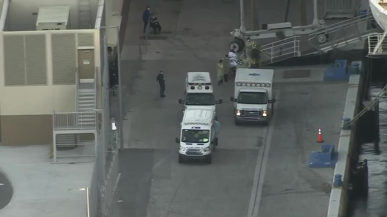 Sick passenger of Holland America Zaandam placed in ambulance at Port Everglades