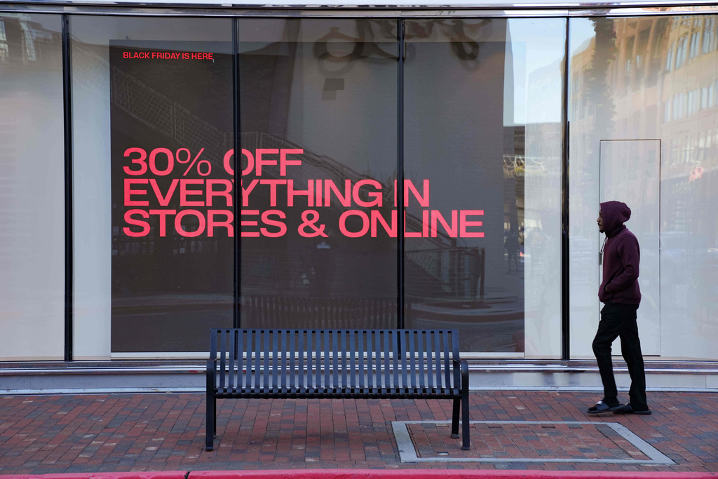 Shoppers browse for Black Friday deals at Atlantic Station outdoor mall, Friday, Nov. 28, 2025, in Atlanta, Ga. 
