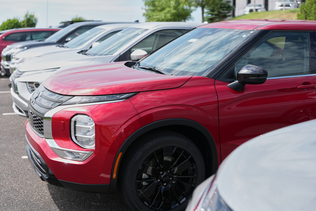 Unsold 2026 Outlander utility vehicles sit at a Mitsubishi dealership Monday, July 27, 2026, in Highlands Ranch, Colo. 