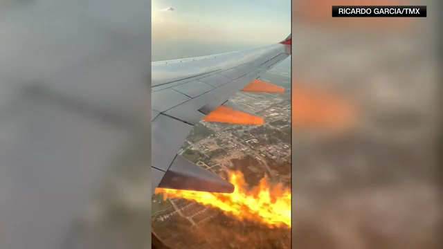 Plane passenger catches video of flames spewing from engine2.00_00_01_05.Still001.jpg
