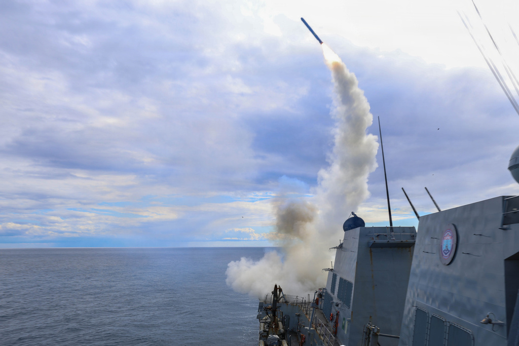 This image provided by U.S. Central Command shows the Arleigh Burke-class guided-missile destroyer USS Thomas Hudner (DDG 116) firing a Tomahawk Land Attack Missile (TLAM) in support of Operation Epic Fury, on Sunday, March 1, 2026.