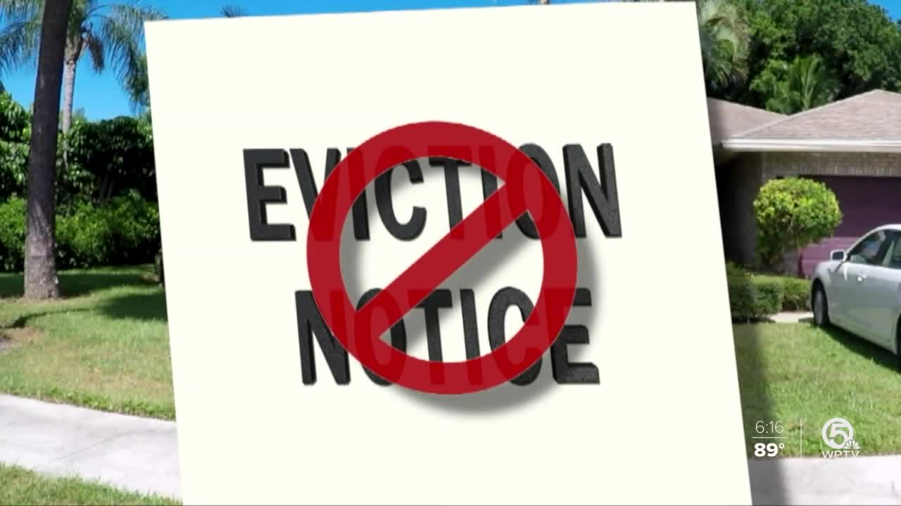 'Eviction Notice' strikeout sign in front of home