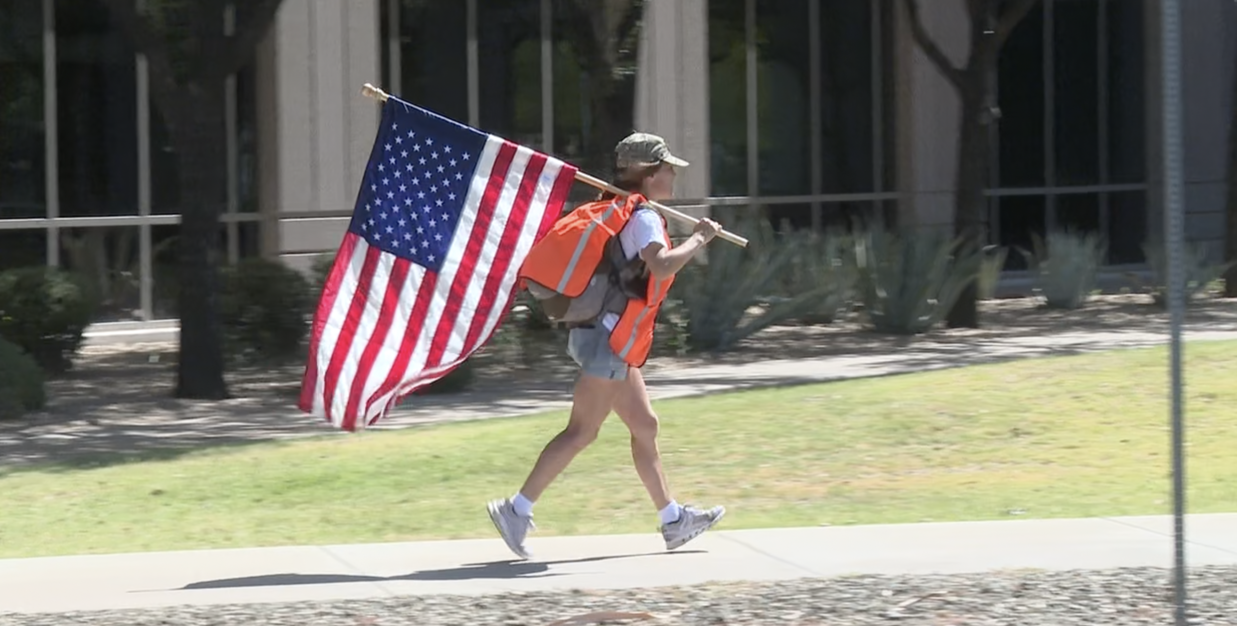 french woman running with flag arizona