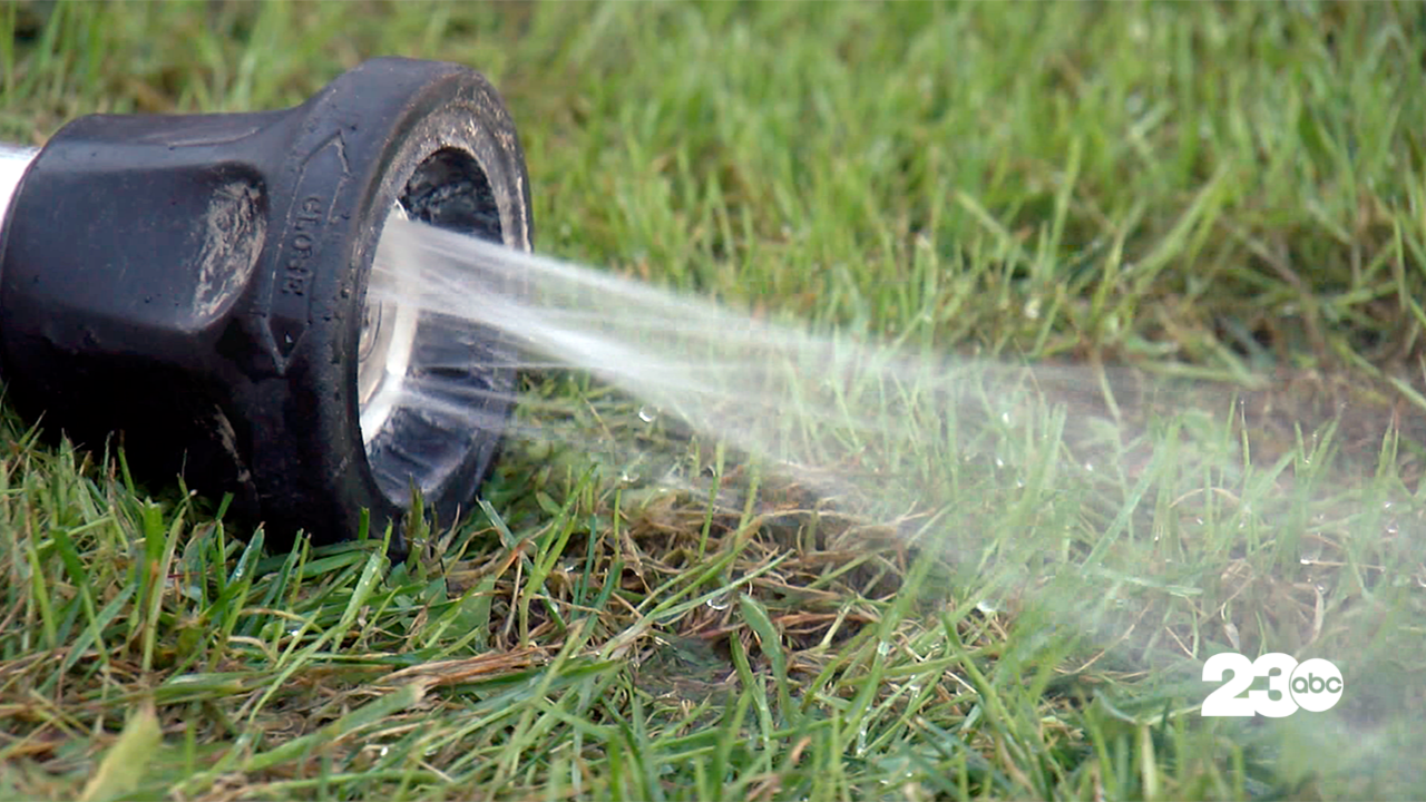 Water Hose Spraying Water, Bakersfield (FILE)