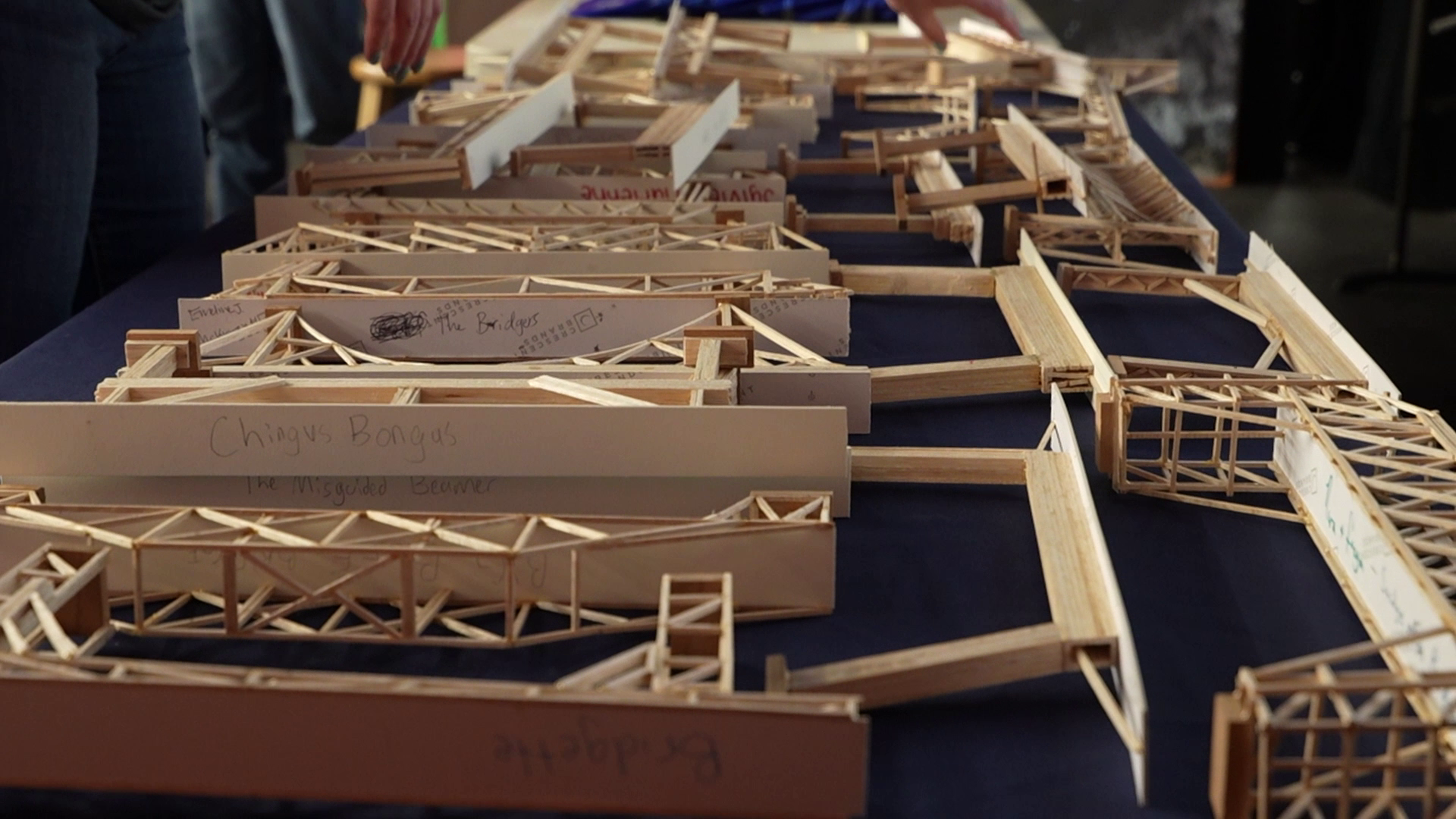 High school students compete in bridge building event