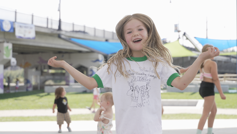 6-year-old, Helli Cole, dancing in Caras Park at the family events for the River City Roots Festival