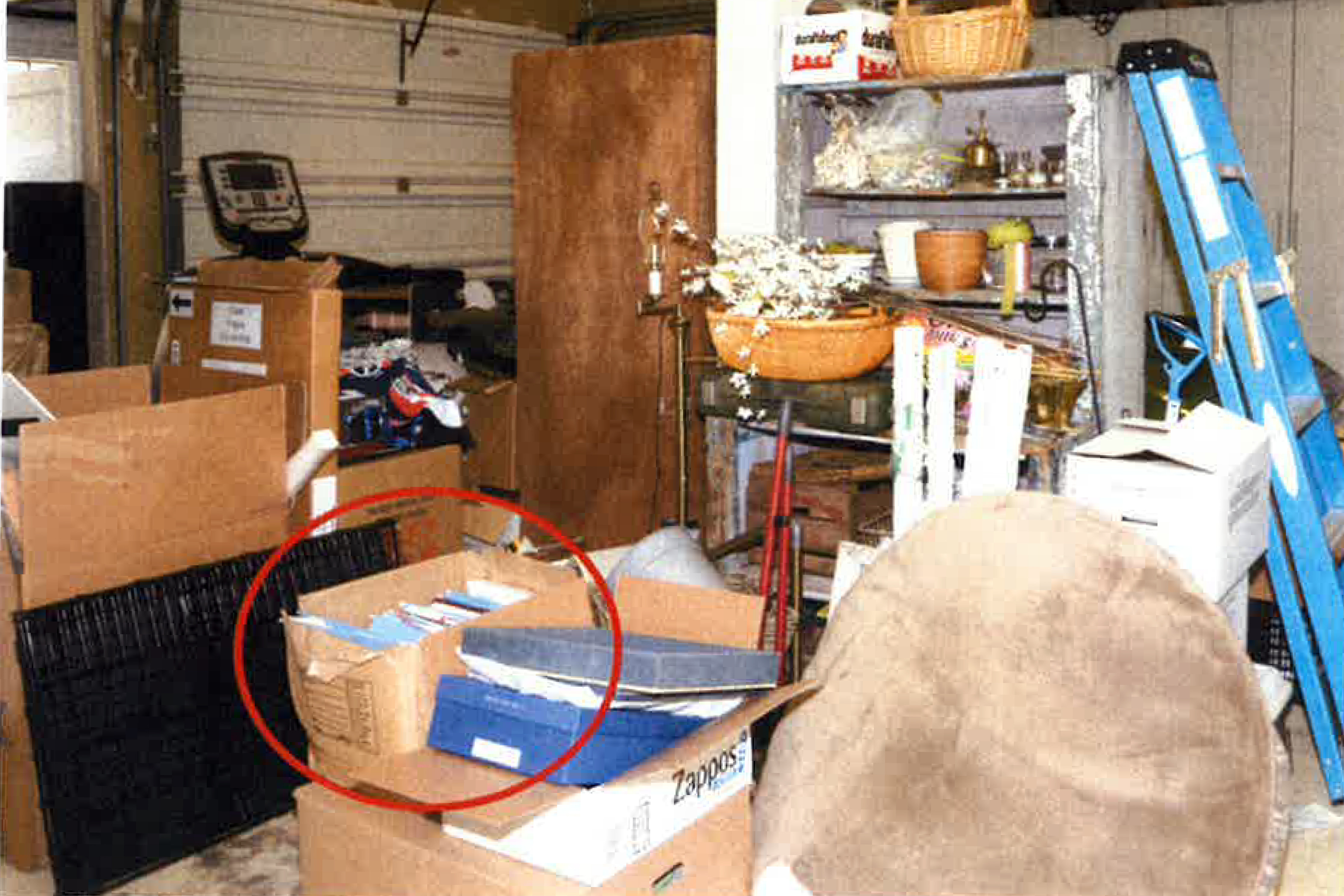 This image, contained in the report from special counsel Robert Hur, shows the box where classified Afghanistan documents were found in the garage of President Joe Biden in Wilmington, Del., during a search by the FBI on Dec. 21, 2022.