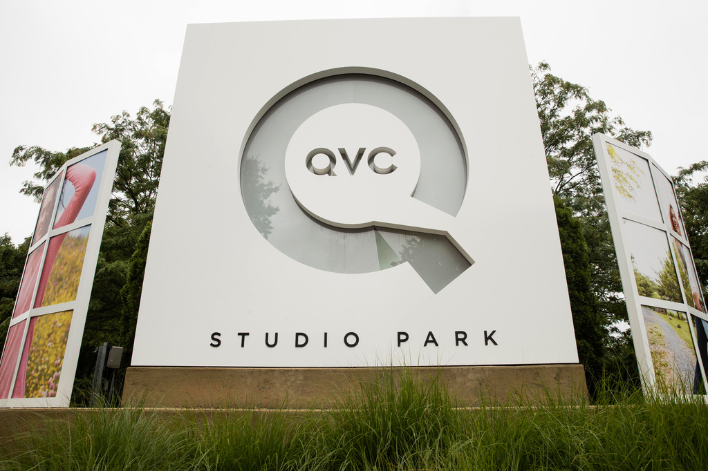 Corporate signage is shown outside a QVC facility in West Chester, Pa., Friday, July 7, 2017.  